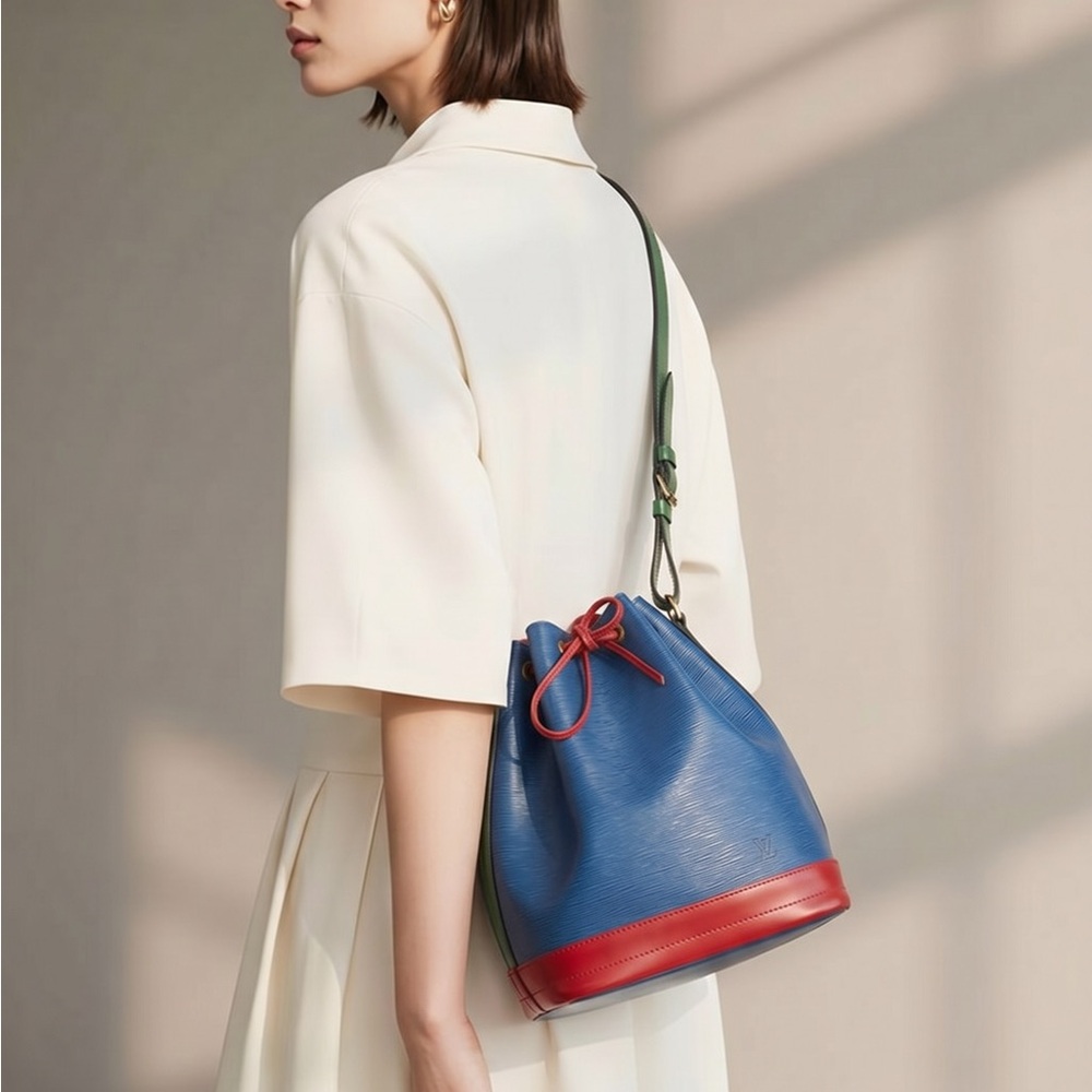 Pre-Loved Authentic Leather Drawstring Bucket Bag in Teal and Red